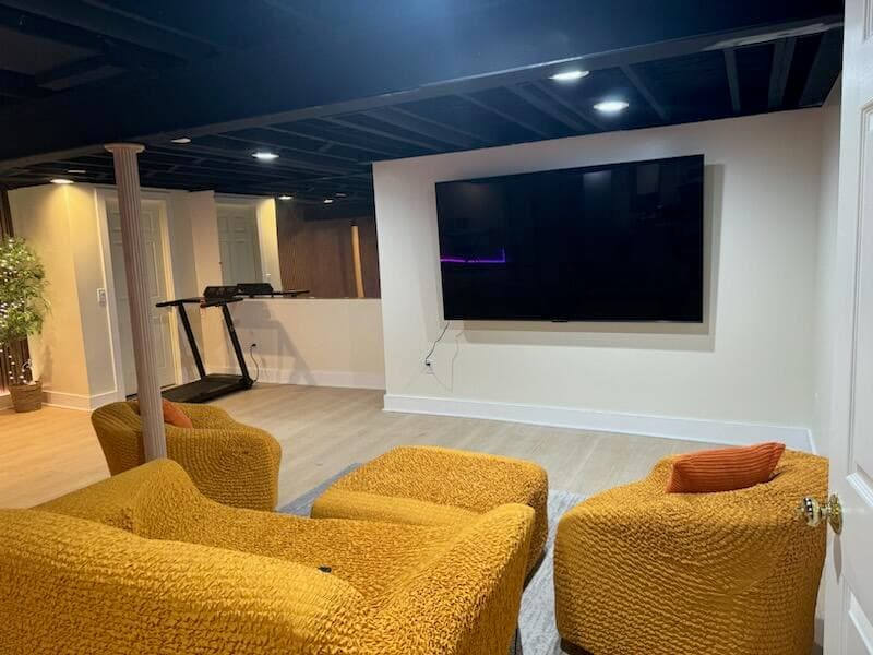 Gallery photos for Unfinished Basement Turned Full Living Space with Bedroom, Kitchen, and Movie Area: Image #3