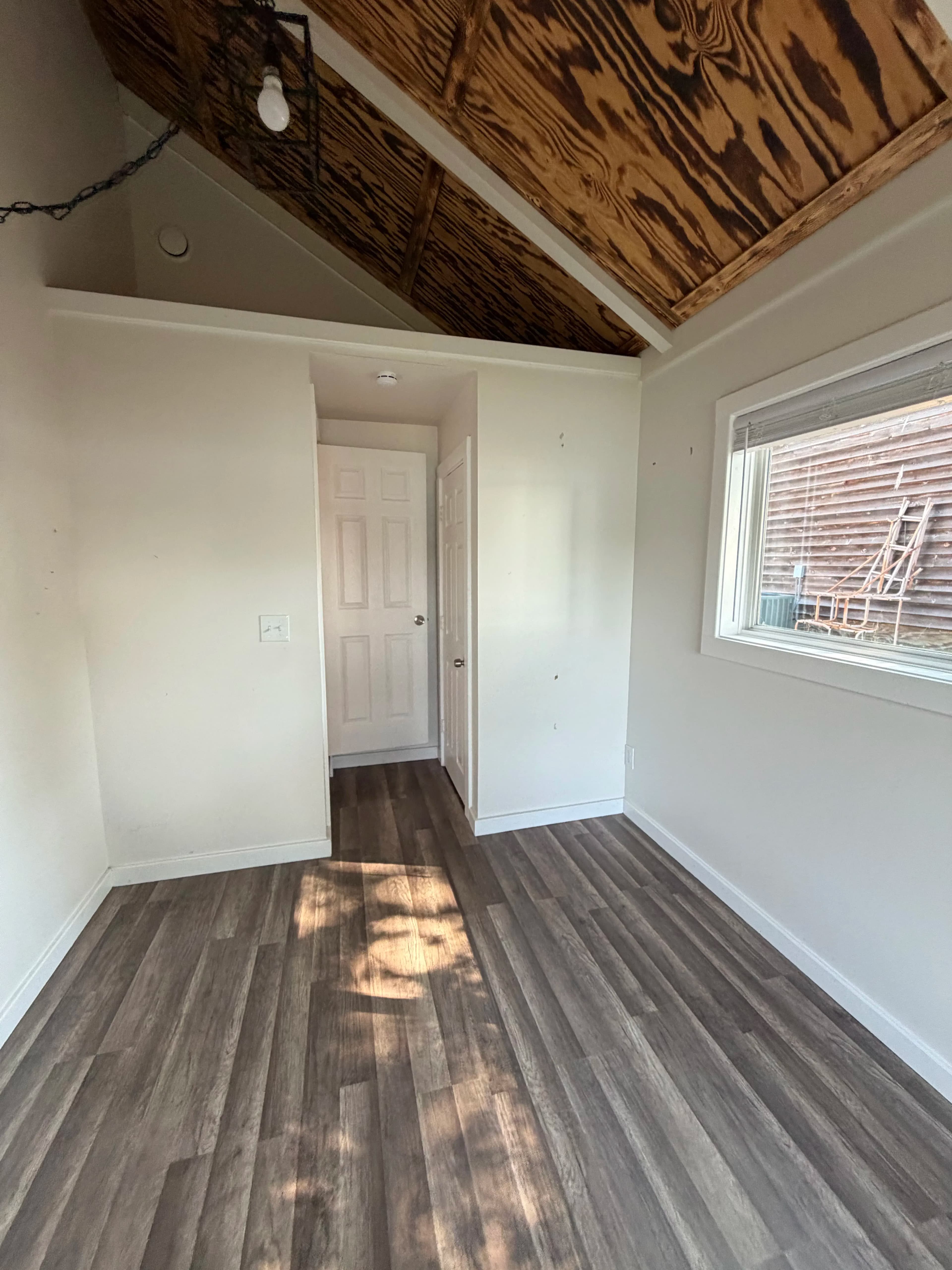Project Lake House Interior Overhaul with New Flooring and Fresh Paint image