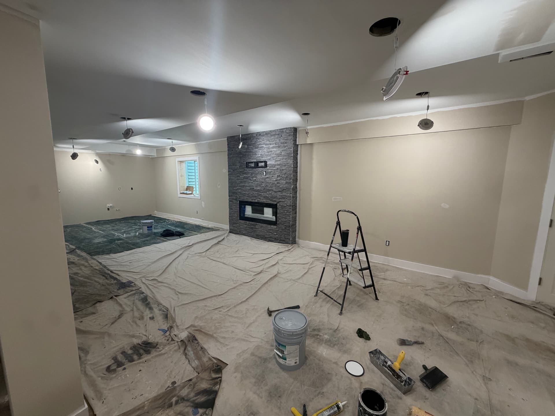 Full Basement Remodel Taking Shape - Paint Done, Cabinets Up Next image