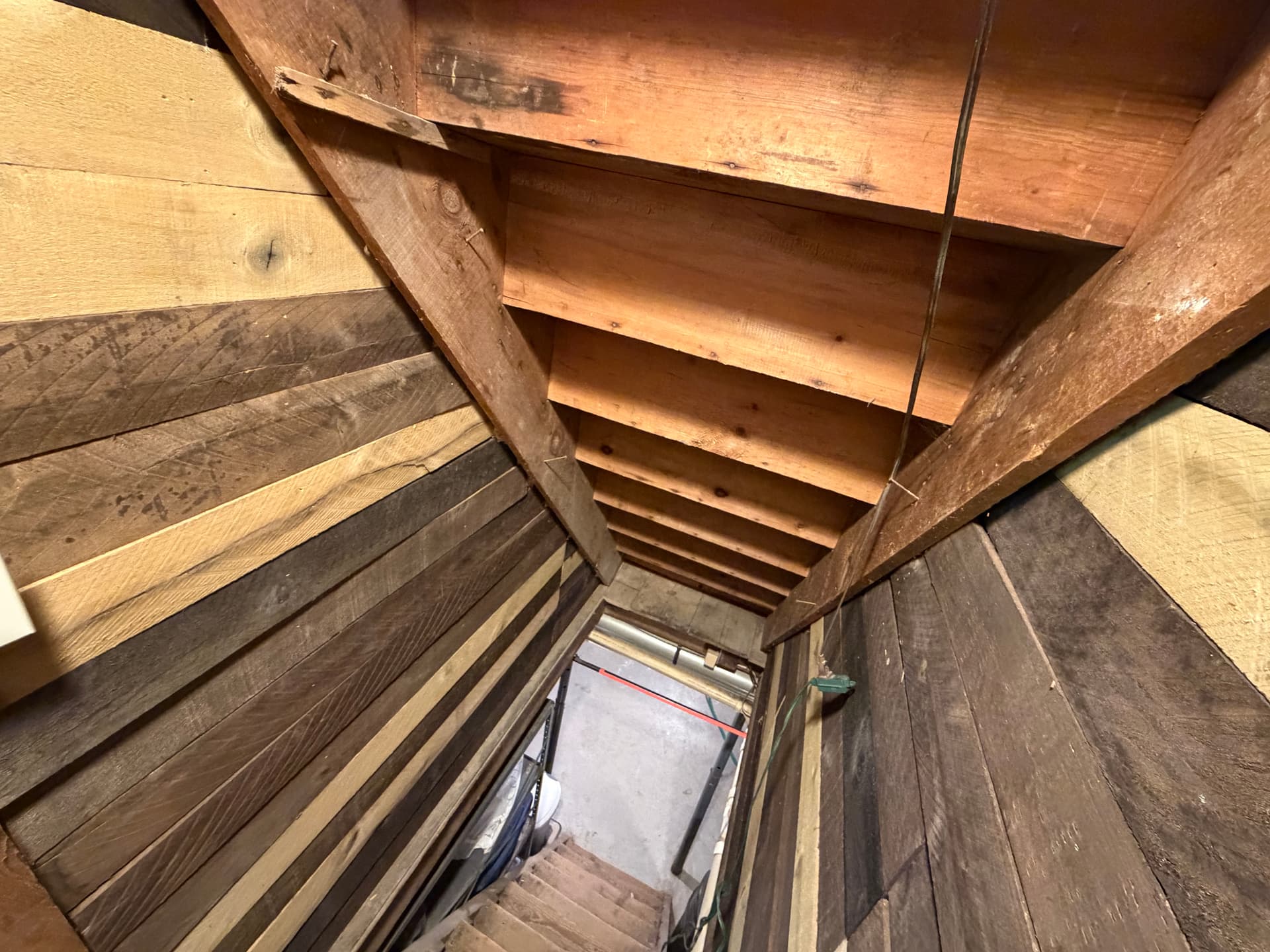 Custom Wood Accent Walls in an Old Farmhouse Basement Entry image
