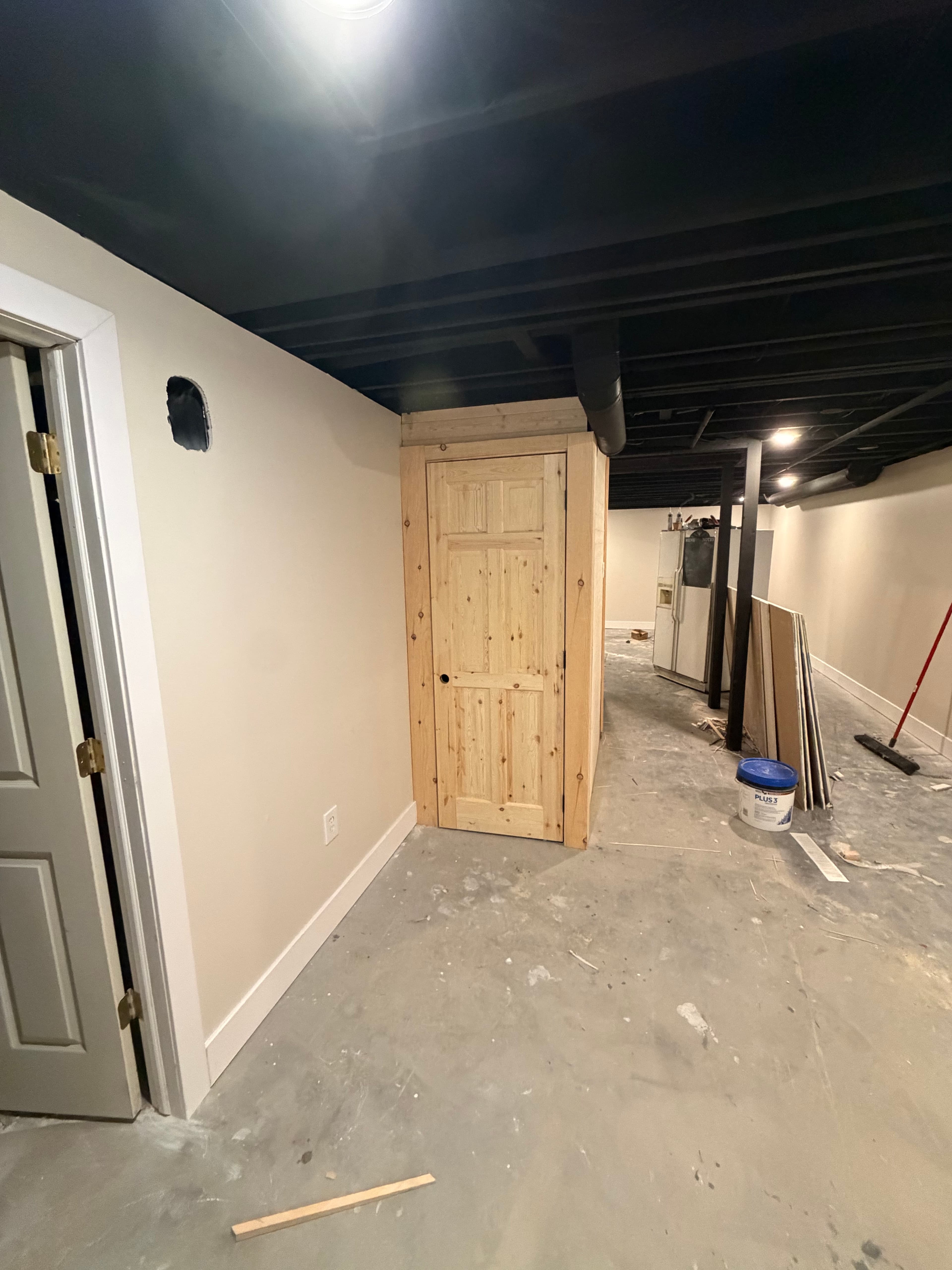 Project Custom Under-Stair Storage Built Into a Basement Remodel image