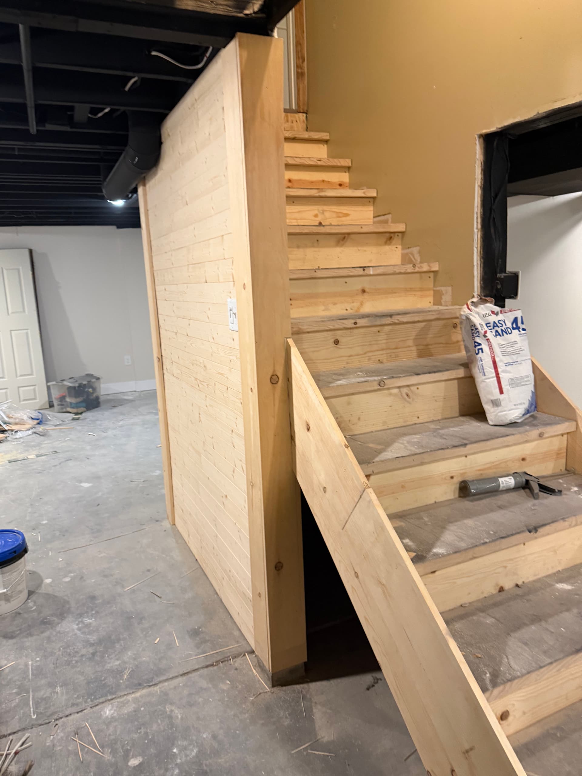 Gallery photos for Custom Under-Stair Storage Built Into a Basement Remodel: Image #2
